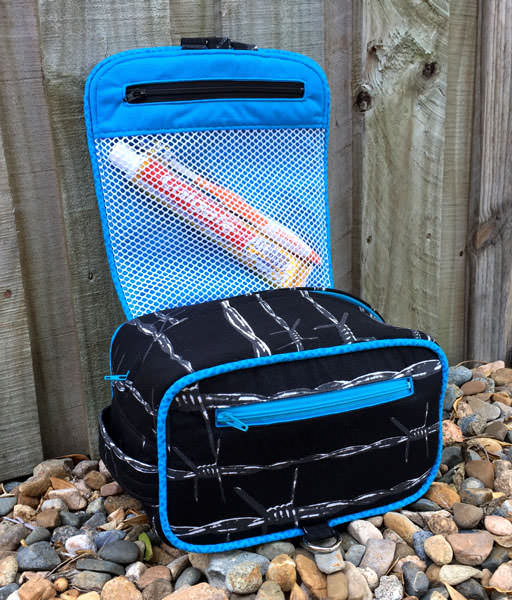 Inside the black barbed wire Hang About Toiletry Bag - Andrie Designs