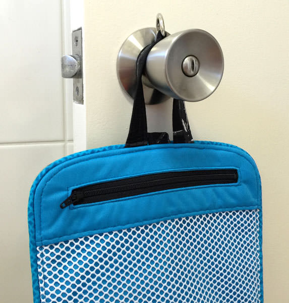 Hang on a door knob or hook! Hang About Toiletry Bag - Andrie Designs