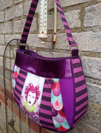 Side view of the Tula Pink-themed Sew Compleat Shoulder Tote - Andrie Designs