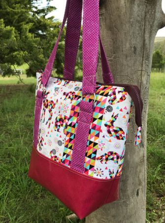Side view of the geometric print Classic Carryall Handbag & Tote - Andrie Designs