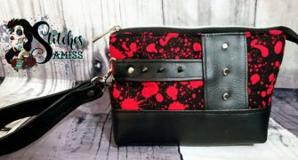 Grunge, rivets and blood make up this Classic Clutch! - Andrie Designs