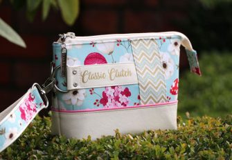 LOVE the fabric combination and detail on Classic Clutch! - Andrie Designs