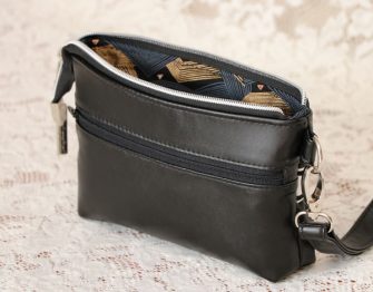 Simple yet effective black Gather Me Up Clutch - Andrie Designs
