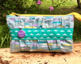 Teal and pastels Gather Me Up Clutch - Andrie Designs
