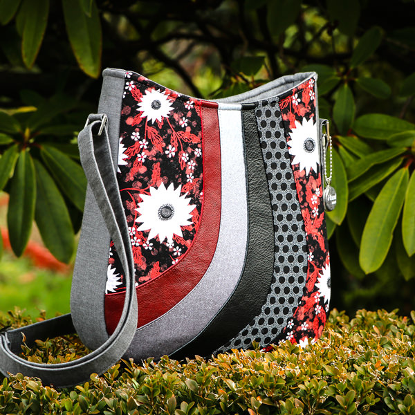 It's classic black, grey and red for this Shades of Yesterday Tote Bag - Andrie Designs