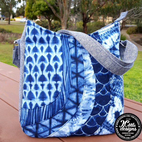 Shades of blue make up this Shades of Yesterday Tote Bag - Andrie Designs