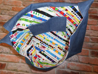 Inside shot of the Colourful Selvages Good-To-Go Messenger Bag - Andrie Designs
