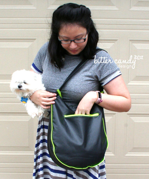 The back zipper pocket is a great size on this black with lime contrast S & S Tote - Andrie Designs