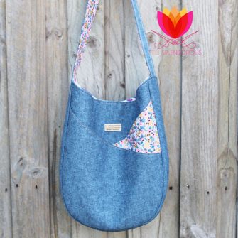 Slouchy view of the beautiful denim and floral S & S Tote - Andrie Designs