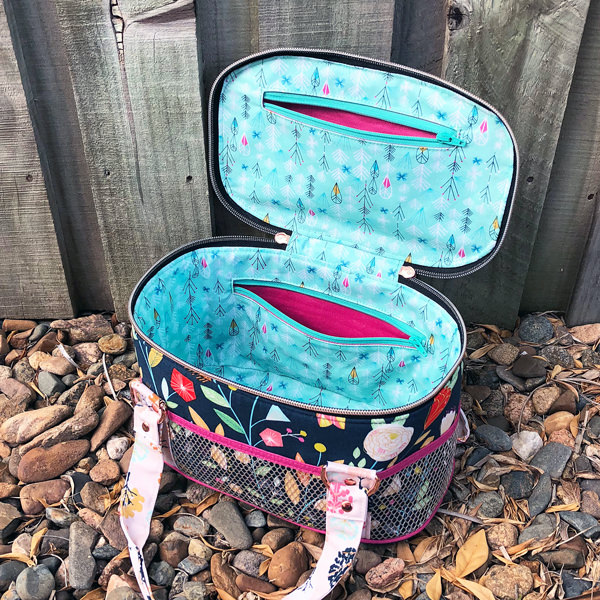 Two zipper pockets are on the inside of the Bree's Box Toiletry Caddy - Andrie Designs
