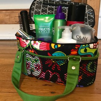 Loaded and ready to use! A sugar skulls Bree's Box Toiletry Caddy - Andrie Designs