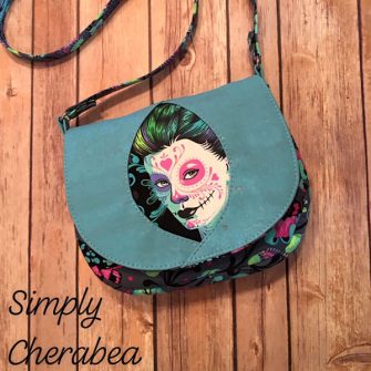 Tula Pink De La Luna was the feature of this Peekaboo Purse - Andrie Designs