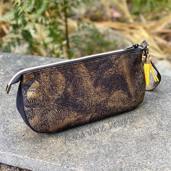 Striking black and gold V Pouch - Andrie Designs