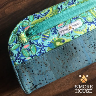 Detail shot of the teal and cork Cleo Everyday Wallet - Andrie Designs