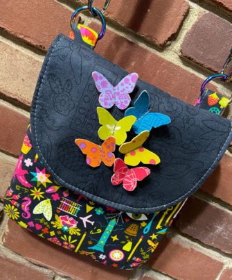 Stunning butterflies in flight Polly Cross Body Pouch - Andrie Designs