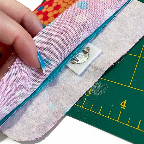 Tuck snap under seam - Layla Trifold Hack - Andrie Designs