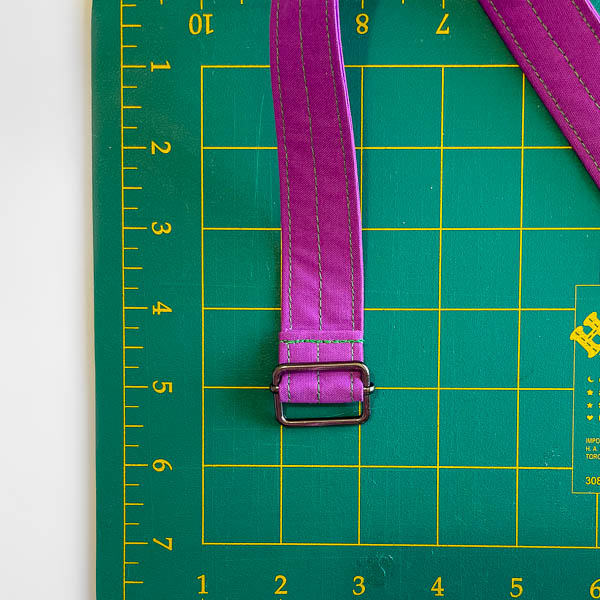 Slider sewn to strap - Stand Up Clutch Crossbody Strap Hack - Andrie Designs