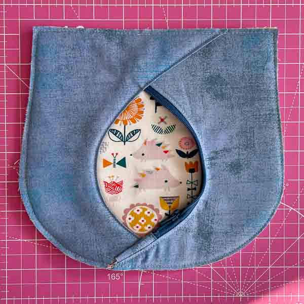 Topstitched and basted in place - Peekaboo Pocket Hack - Andrie Designs