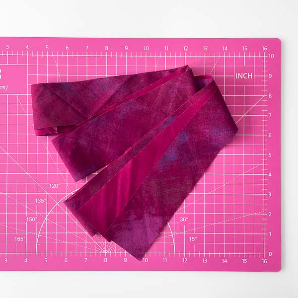 Bias strip done - Triangle folded in half - How to Cut and Join Bias Strips - Andrie Designs