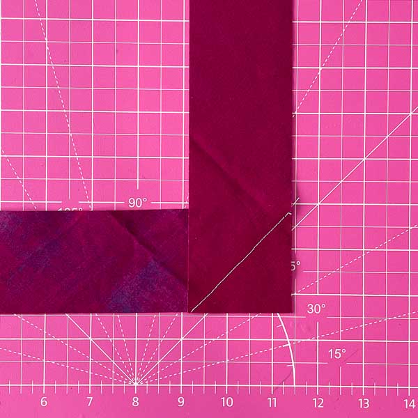 Line Sewn - Triangle folded in half - How to Cut and Join Bias Strips - Andrie Designs